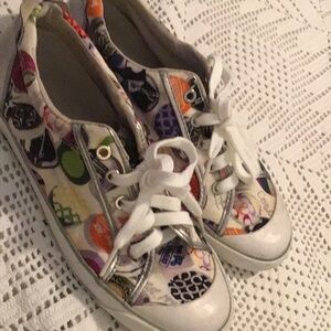 Coach Silver Sneakers with Vibrant Floral Lining. Good